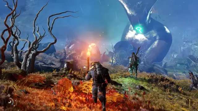 Giant statue looming over dark grasslands.