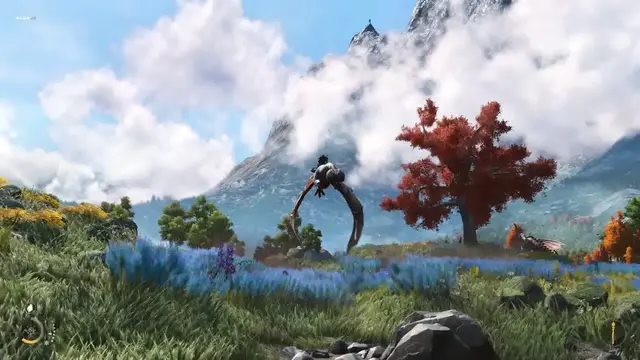 Flight past a snowy mountainside above flat grassland.